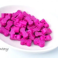 Drevená korálka - mašlička - 20 x 10 mm - fuchsia