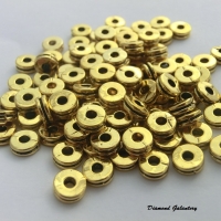 Korálky 6 mm okrúhle s výrezom - zlaté