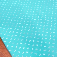 Teplákovina - Mašličky tyrkys - cena za 10 cm