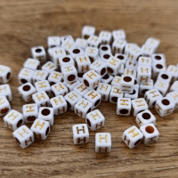 Korálka písmenko - Bielo zlaté - 6 x 6 mm - H
