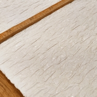Prešívaná vetrovkova látka - Biela lesklá so vzorom - cena za 10 centimetrov