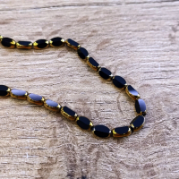 Korálka - 4 x 7 mm - Čierna so zlatým okrajom