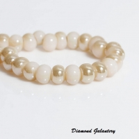 Korálka 6 x 5 mm - Champagne