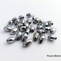 Obrusované korálky 6 x 8 mm - strieborné