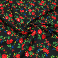 Krojova látka - Kvety červené malé na čiernom - cena za 10 cm