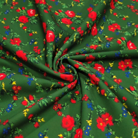 Krojova látka - Kvety červené malé na zelenom - cena za 10 cm